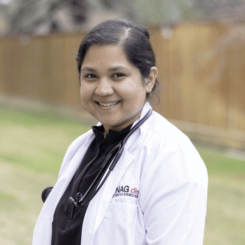 Professional portrait of Alina Momin, FNP, providing family and primary care at NAG Clinics in Pasadena and Texas City, TX.